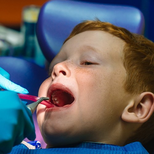 Boy seeing emergency kid’s dentist in Levittown