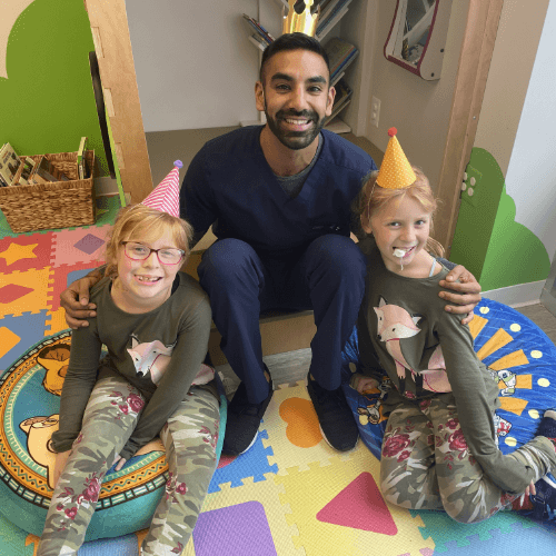 Doctor Singh and two young dental patients