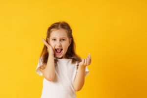 Kid missing front tooth.